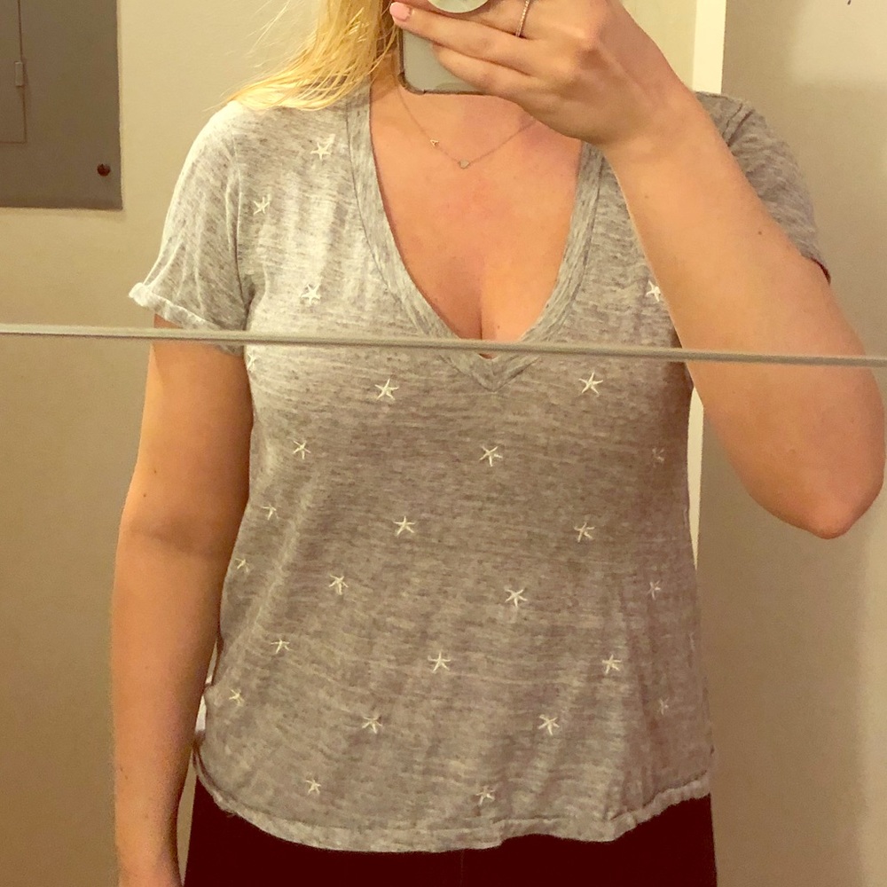 gray V neck shirt